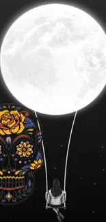 Artistic wallpaper with skull and moon design.