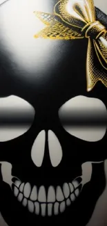 Black skull with a gold bow, artistic design.