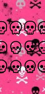 Pink background with black skull patterns.