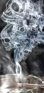 Artistic skulls emerging from smoke in a dark, mysterious design.