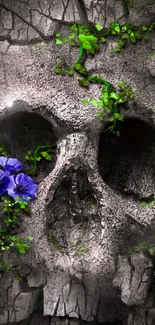 Gray cracked skull with purple flowers and green foliage.