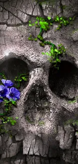 Cracked skull with green vines and purple flowers for a gothic mobile wallpaper.