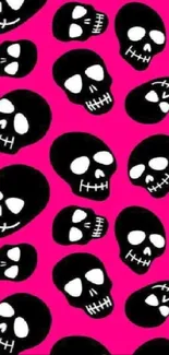 Black and white skulls pattern on hot pink background.