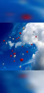 Colorful balloons floating in a blue sky with clouds.