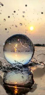 Sunset reflected in a water sphere, creating a serene and artistic mobile wallpaper.