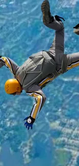 Skydiver freefalling over blue skies and landscape background.