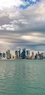 City skyline with reflective water and cloudy sky mobile wallpaper.