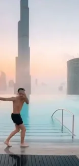 Man enjoying a rooftop pool with city skyline at sunset.