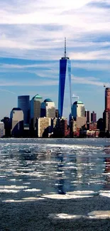 Skyline reflection on water, city skyscrapers visible.