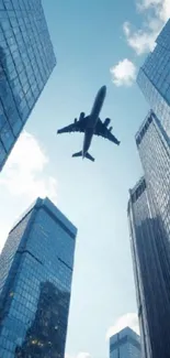 Airplane flies above modern skyscrapers with a blue sky.