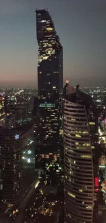 Nighttime cityscape with towering skyscrapers and illuminated buildings.