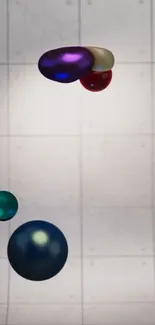 Colorful abstract spheres on a gray grid background.