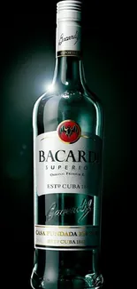 Bacardi bottle glowing with elegance in the dark.