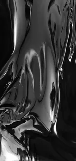 Sleek glossy black abstract wallpaper with liquid texture.