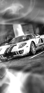 Monochrome sports car parked, exuding elegance and speed in black and white.