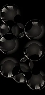 Reflective black bubbles on a sleek dark background mobile wallpaper.