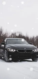 Black car driving through snowy forest landscape.