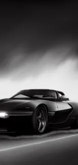 Sleek black sports car mobile wallpaper.