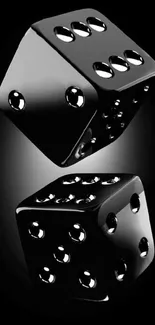 Sleek black dice on a dark background.