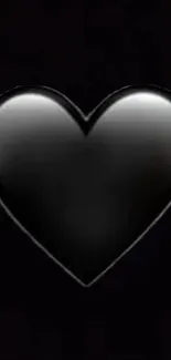 Glossy black heart on dark background for phone wallpaper.