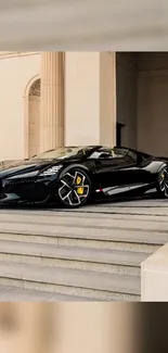 Sleek black luxury sports car against a classical architectural backdrop.