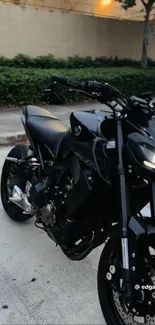 Sleek black motorcycle parked in urban setting