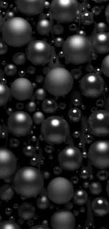 Sleek mobile wallpaper with black spheres.