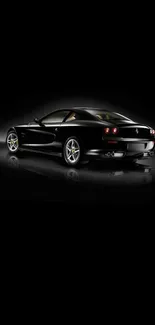 Sleek black sports car on dark background wallpaper.