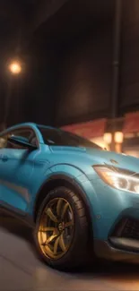 Sleek blue car with golden rims in urban night setting.