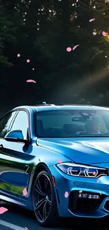 Sleek blue car on a scenic road at sunset.