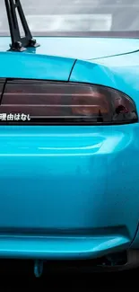 Sleek blue car rear view with vibrant design.