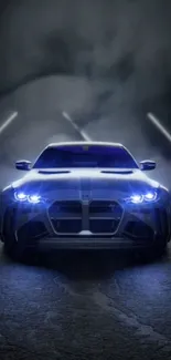 Sleek blue car with glowing headlights.