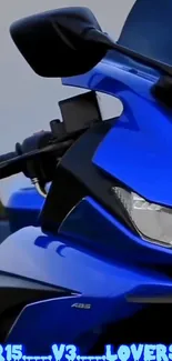 Close-up of sleek blue motorcycle design.