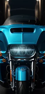 Sleek blue motorcycle under urban streetlights on a mobile wallpaper.