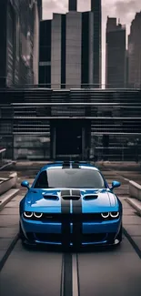 Sleek blue sports car in cityscape wallpaper.