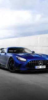 Blue sports car with sleek design on a minimalist background.