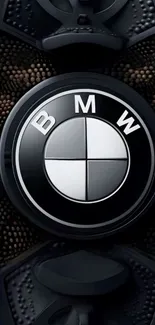 BMW logo on a dark textured background.