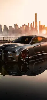 Sleek car with city skyline during sunset, reflecting on surface.