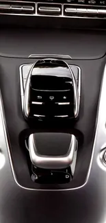 Sleek car control panel with metallic design details.