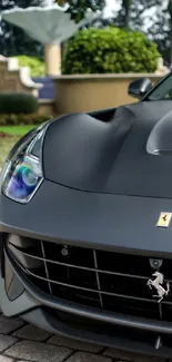 Sleek luxury sports car front view in elegant dark gray.