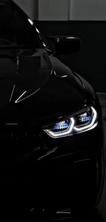 Sleek car headlight in dark garage setting