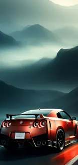 Sleek car driving through misty mountains at night.