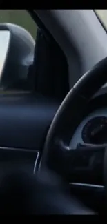 Sleek car interior featuring steering wheel and dashboard view.