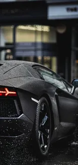 Sleek black car on rainy urban street, showcasing luxury.