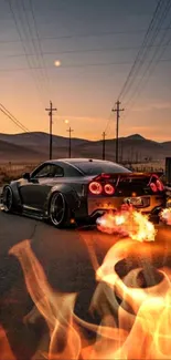 Car with flames at sunset on open road.