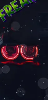 Car taillight glowing in the dark.