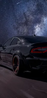 Sleek black car driving under a starry night sky.