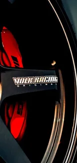 Close-up of a sleek car wheel with vibrant details.