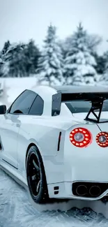 White sports car in snowy landscape, winter scene with trees.