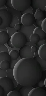 Dark abstract wallpaper with black spheres.